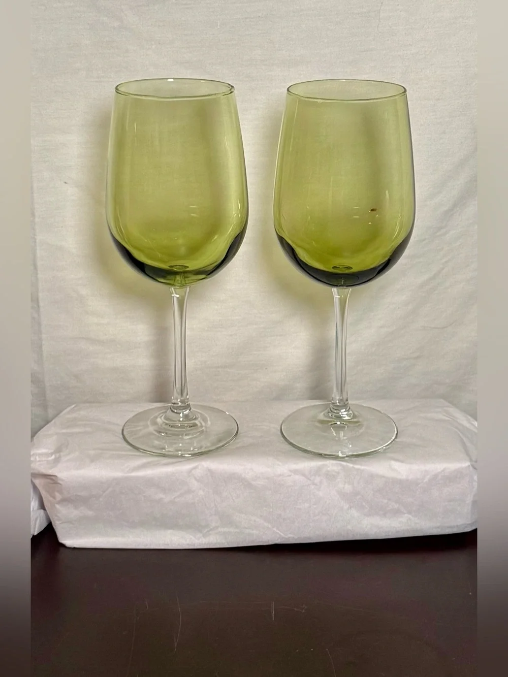2 Pier 1 Pantiago wine glasses. Olive green bowl paired with a clear stem. 16oz